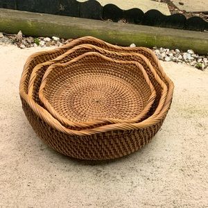 Three Nantucket style woven baskets.